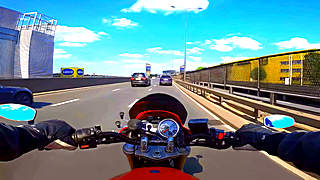 Motorcycle Ride in London on a Clear Day
